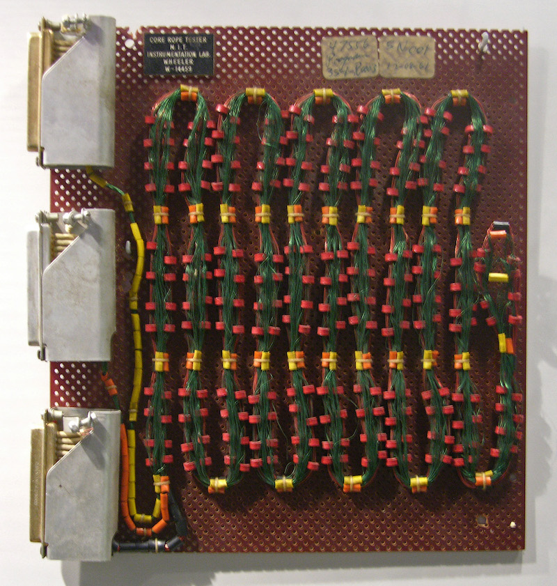 Image of a circuit board with green wire loops